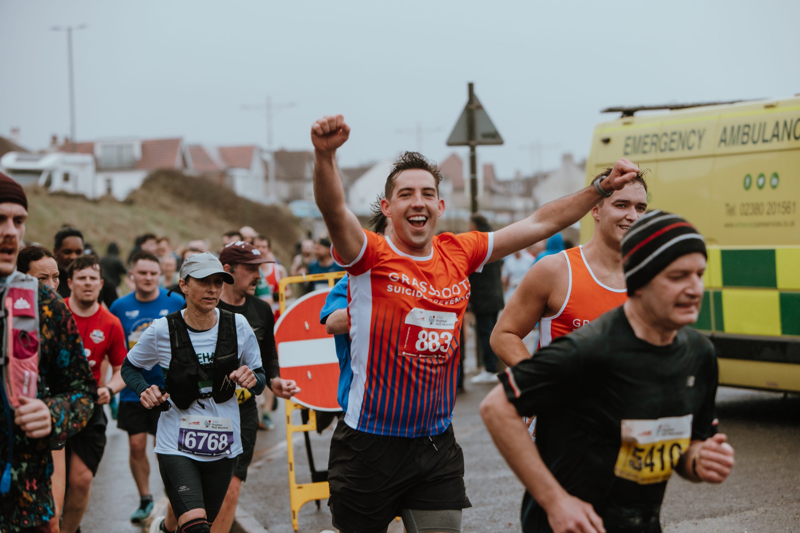 Marathon runner celebrating