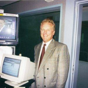 Man next to computer.